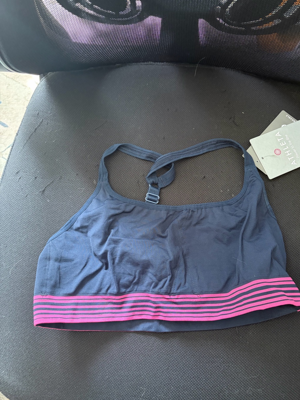 Athleta navy sports bra with pink striped band